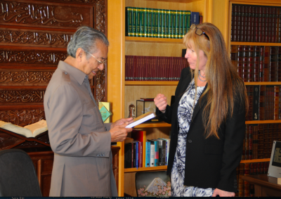 Receiving a copy of Money Logging, the book about timber corruption in Sarawak