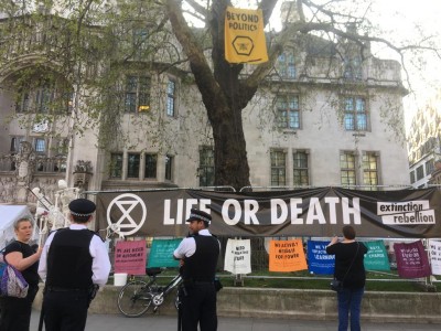 Police take a soft management approach as protestors block off the traffic from Parliament Square